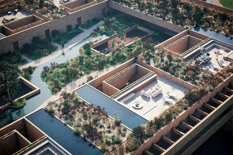 central courtyard + terraces by OODA bring nature into cloister-like residential complex in portugal