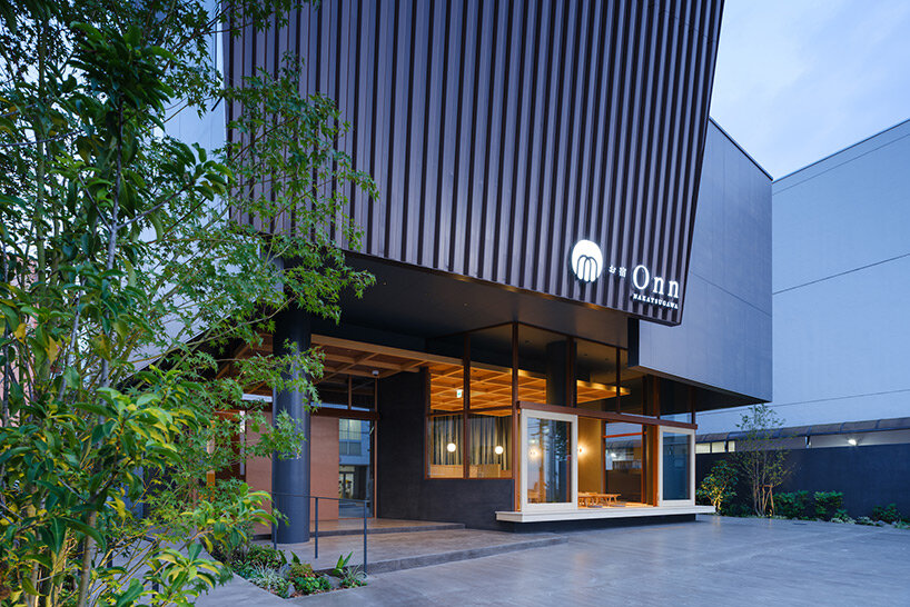 clad in japanese wood, naruse inokuma's hotel recreates the experience of climbing a mountain