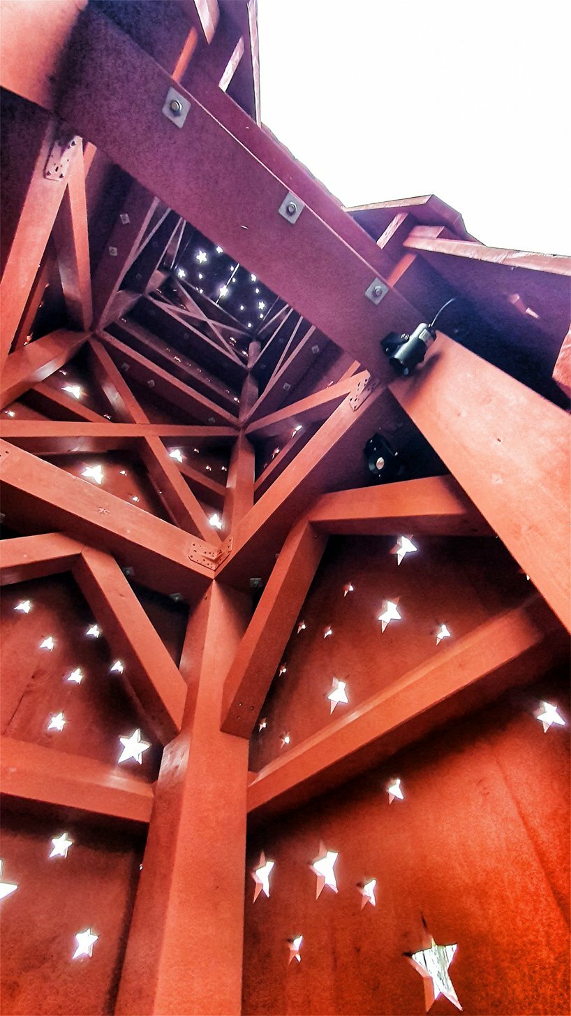 the tower and roof are perforated in star pattern