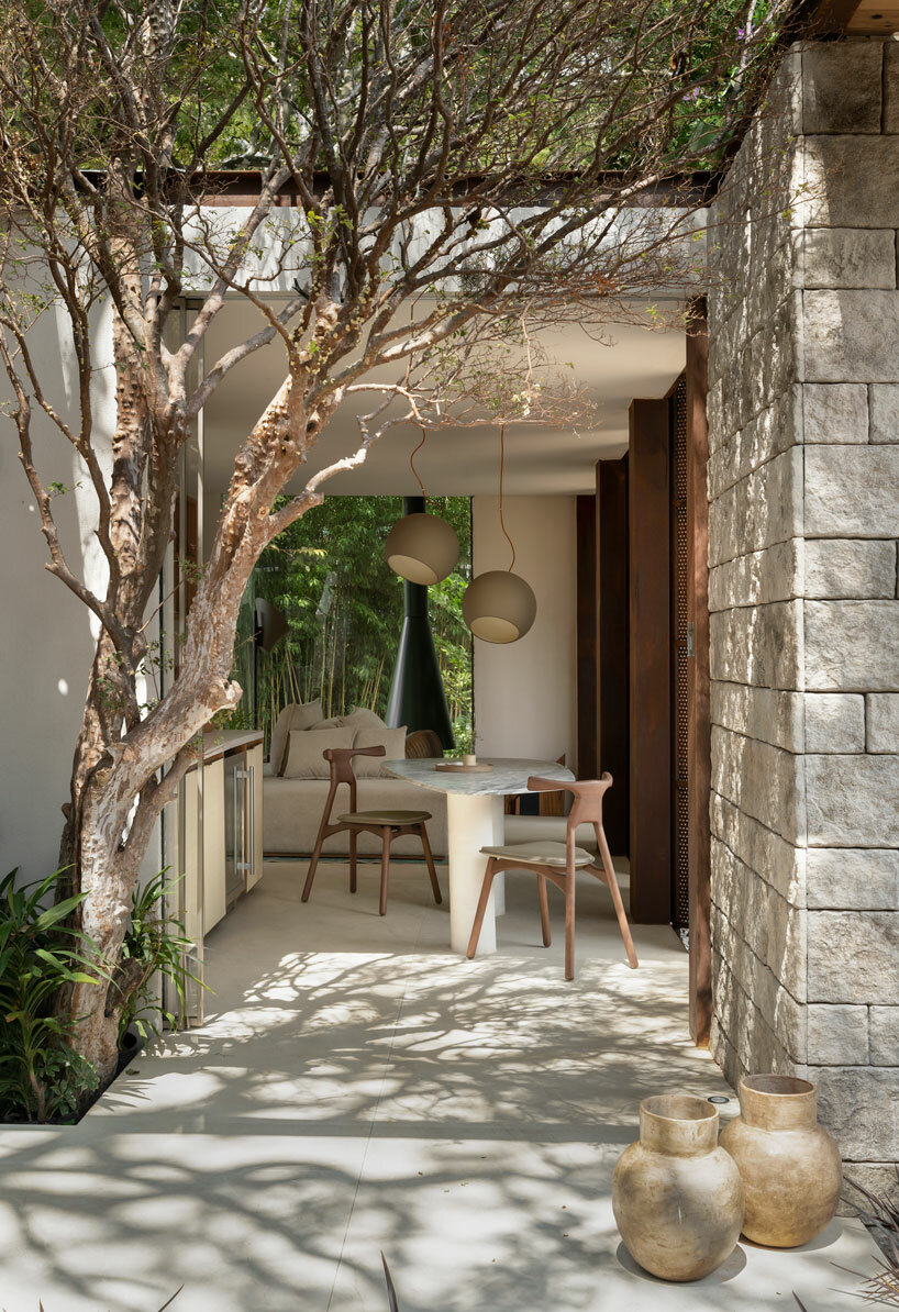 perforated louvers in corten steel envelop getaway cabin in belo horizonte, brazil - 1