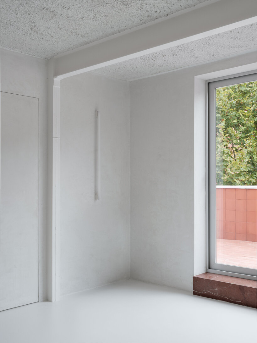 raw and unfinished, HANGHAR rio house in madrid presents residents with 'naked scenario'