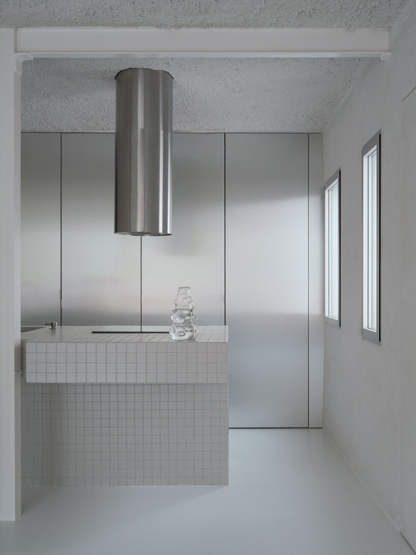 raw and unfinished, HANGHAR rio house in madrid presents residents with 'naked scenario'