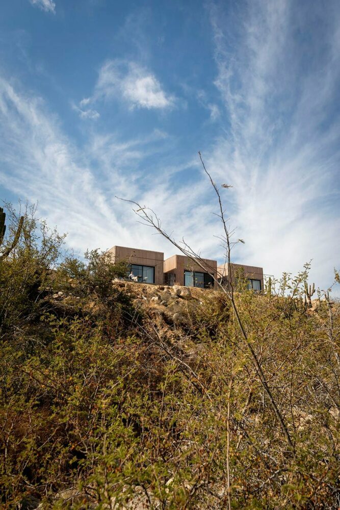 the cluster sits perched above a creek