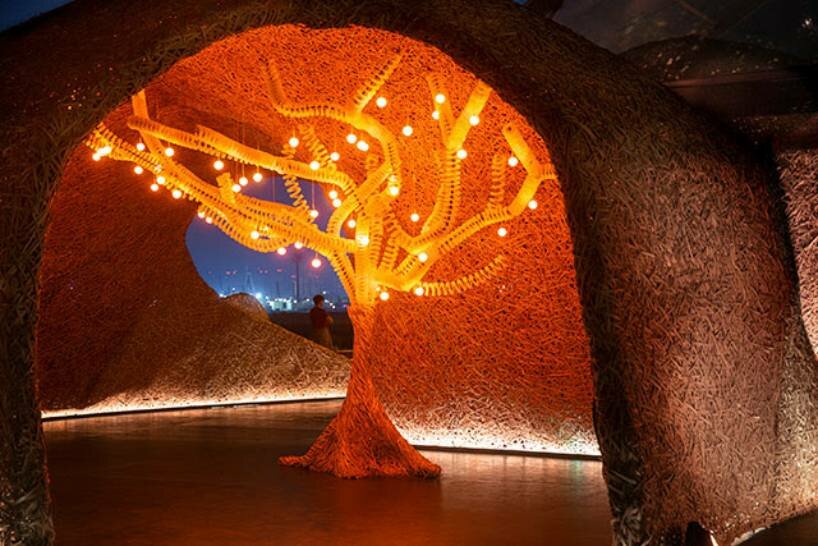 Hermès weaves a garden of life-size bamboo caves from recycled brushes in qatar - 7