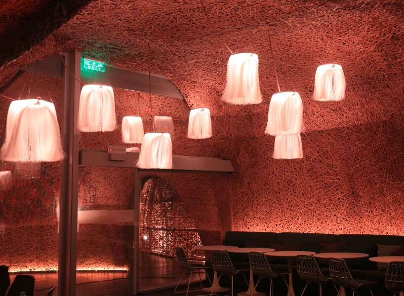 Hermès weaves a garden of life-size bamboo caves from recycled brushes in qatar - 5