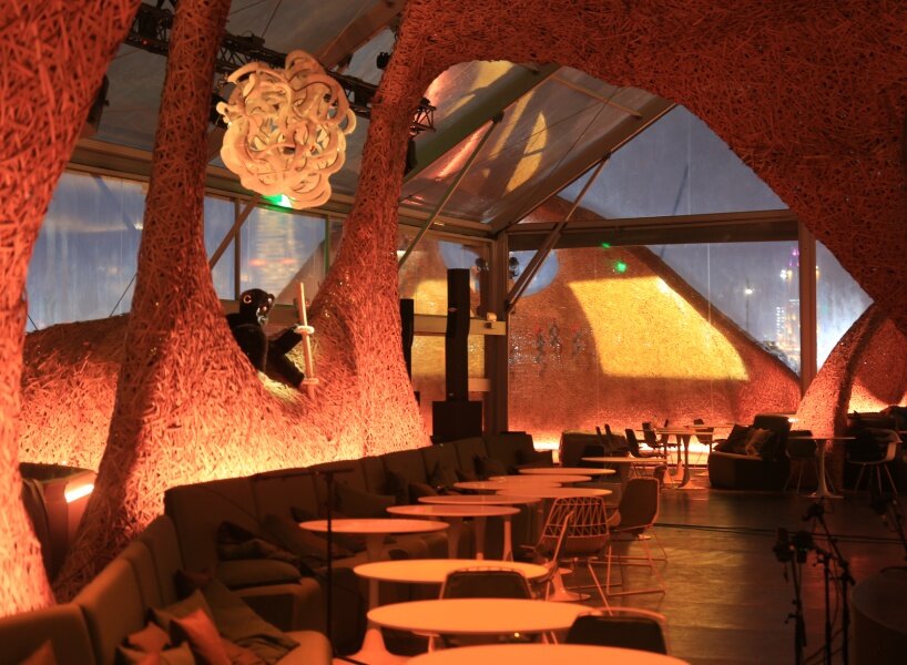 Hermès weaves a garden of life-size bamboo caves from recycled brushes in qatar - 3