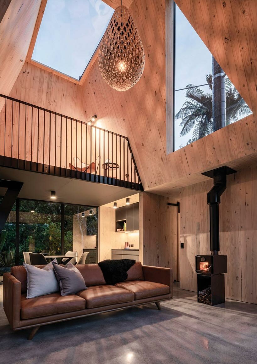 cut out skylights bring nature within biv cabin in new zealand