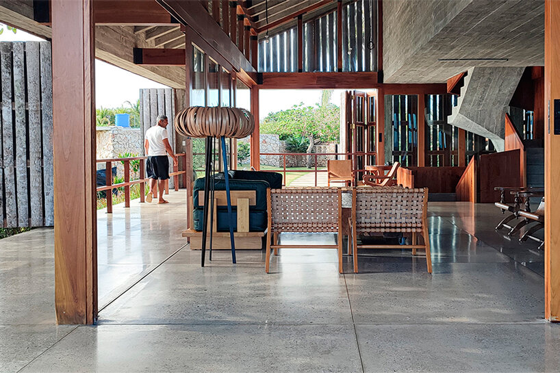 palm wood skin shields residence + portico structure by infraestudio in havana