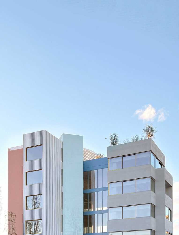 neiheiser argyros revives old office building as multicolored blocks
