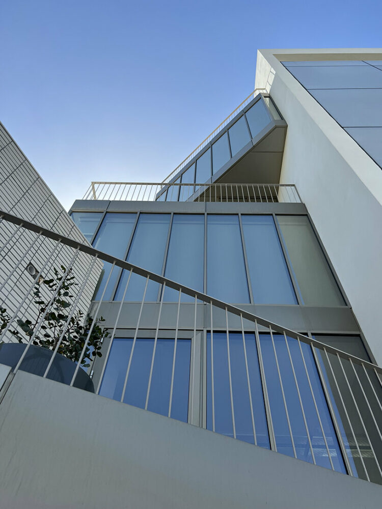 neiheiser argyros revives old office building as multicolored blocks