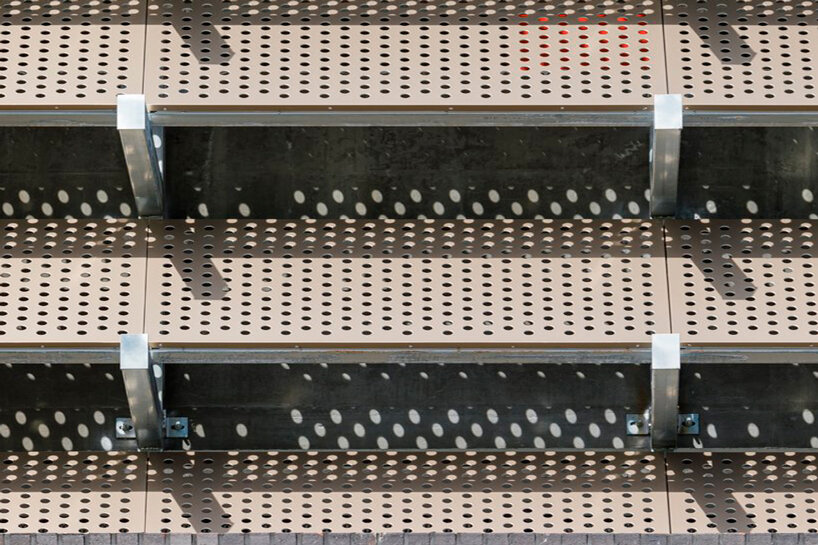 parking complex in korea enfolds multiple levels in scaffolding skin