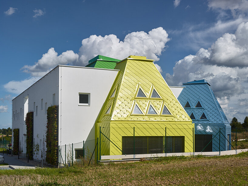 protruding, colored 'sheds' envelop architektura's kindergarten design in czechia - 3