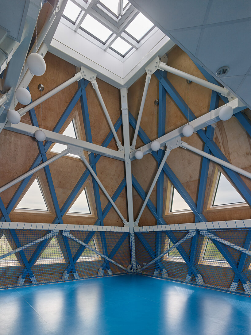protruding, colored 'sheds' envelop architektura's kindergarten design in czechia - 5