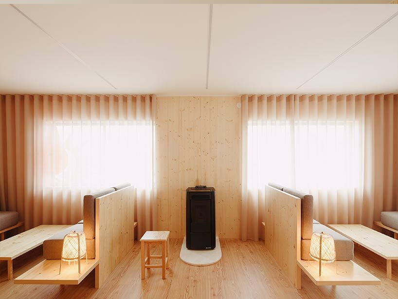 funnel-shaped cutouts finish snug restaurant in portugal