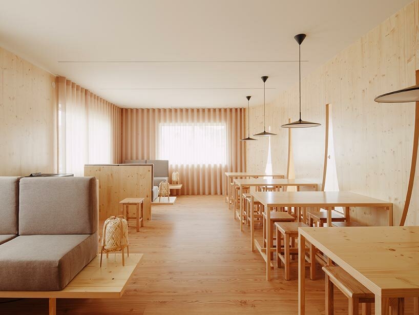 funnel-shaped cutouts finish snug restaurant in portugal