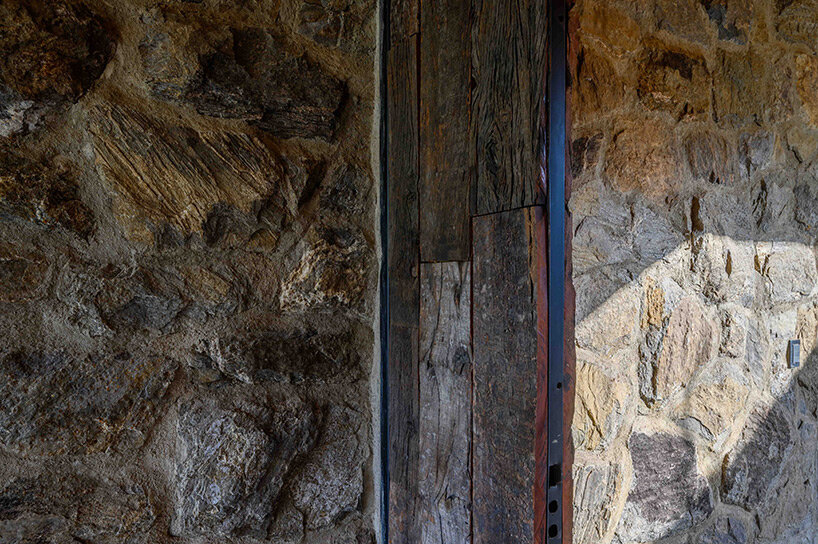 a house of stone dubbed ‘casa piedra’ shows warm interiors in argentina