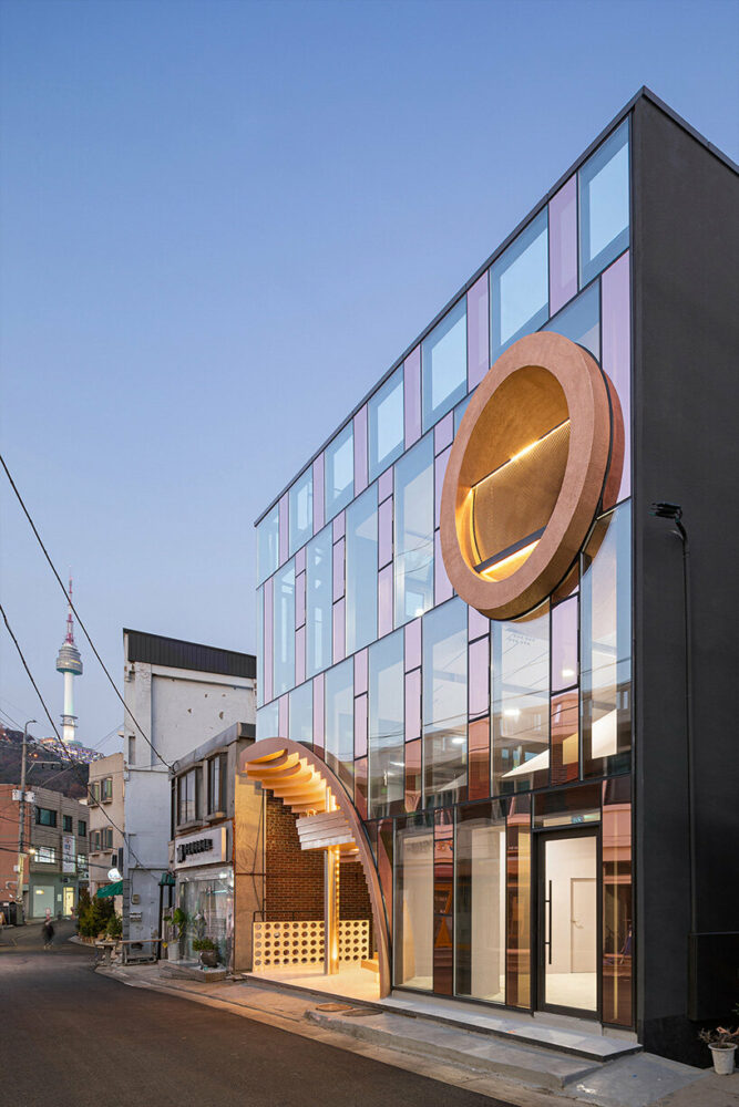 concrete cuts and curves pierce through moon hoon-renovated building in seoul