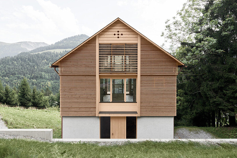 innauer matt perches secluded timber house along mountainous landscape in austria