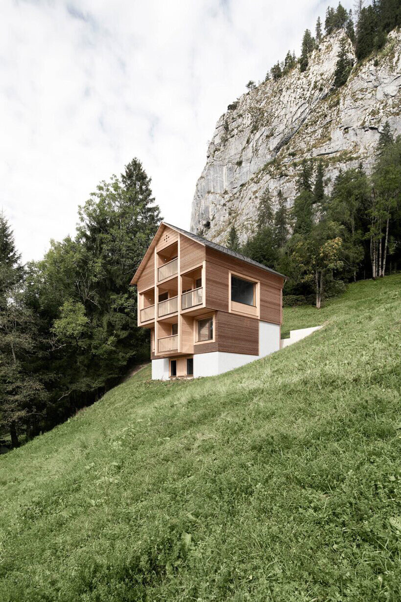 innauer matt perches secluded timber house along mountainous landscape in austria