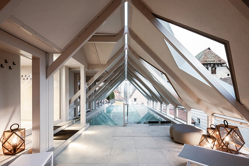 noa* redesigns goldene rose hotel under a historic roof, as a 'kaleidoscope of the past'