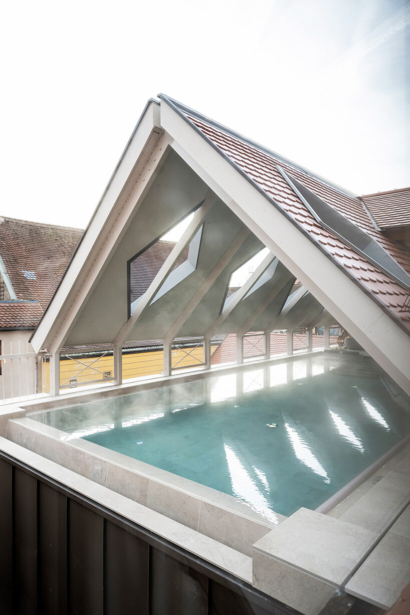 noa* redesigns goldene rose hotel under a historic roof, as a 'kaleidoscope of the past'