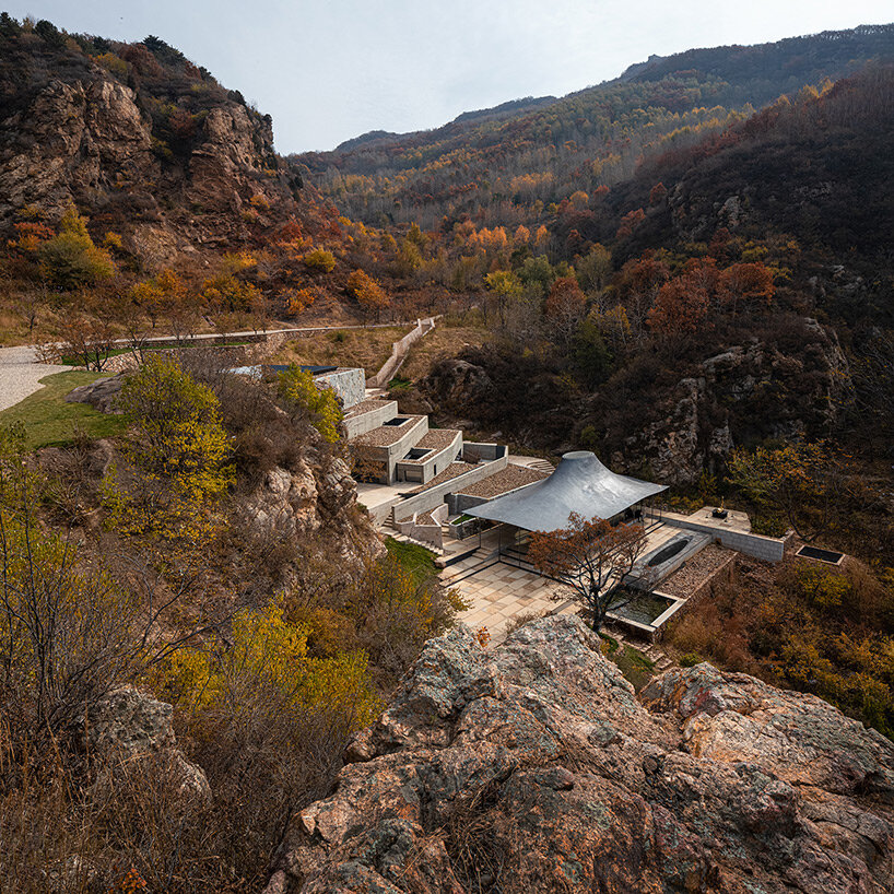 sculptural carbon fiber roof funnels light into atelier deshaus' meditation hall in china