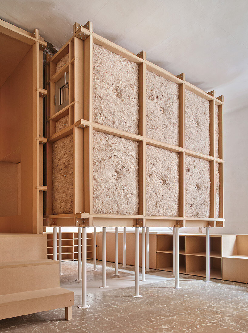 TAKK exposes old partitions + electrical installations in energy-conscious barcelona revamp