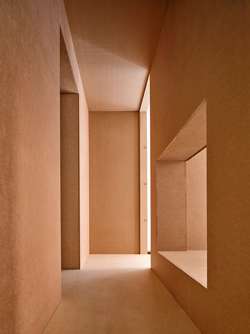 TAKK exposes old partitions + electrical installations in energy-conscious barcelona revamp