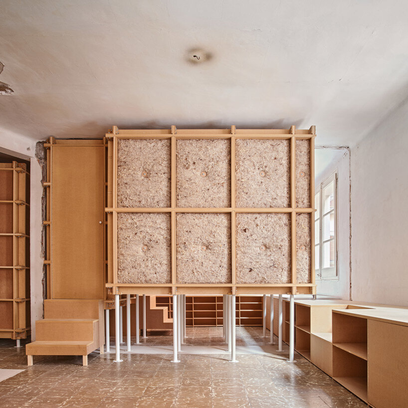 TAKK exposes old partitions + electrical installations in energy-conscious barcelona revamp