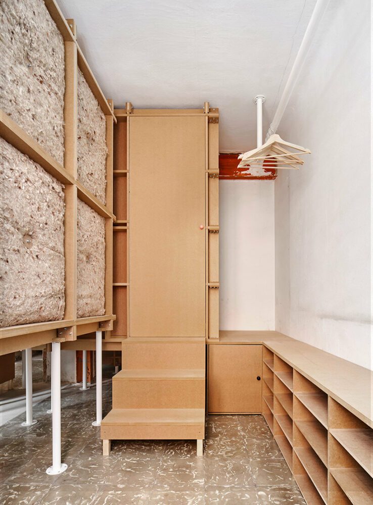 TAKK exposes old partitions + electrical installations in energy-conscious barcelona revamp