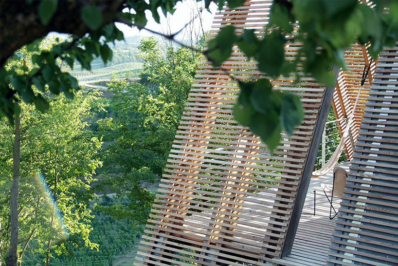 atelier LAVIT inserts eco wooden cabins into vineyards and woodlands of rural italy 
