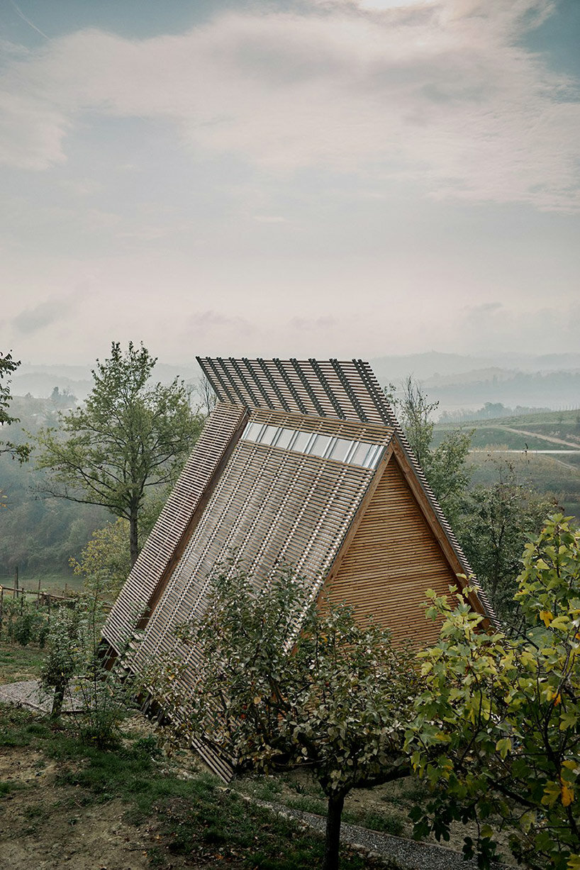 atelier LAVIT inserts eco wooden cabins into vineyards and woodlands of rural italy 
