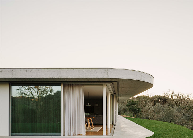 concrete geometries embrace bruno dias' casa chouso in portugal