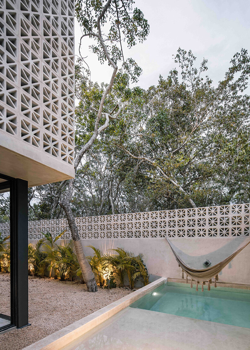 recoveco sculpts ‘casa coral’ as a permeable, monolithic dwelling in mexico - 3