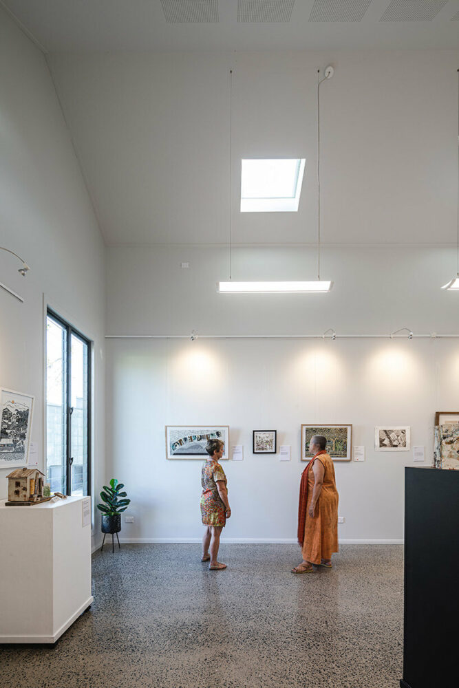colorful timber screen with hidden morse code message decorates art gallery in australia