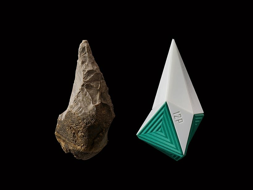 the original stone hand-axe and its rebirthed, reduced polygon (12 faces), nylon and zirconia new self