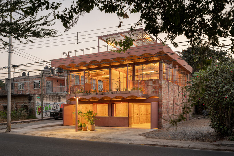 vaulted brickwork community center built by the citizens adorns rural mexico