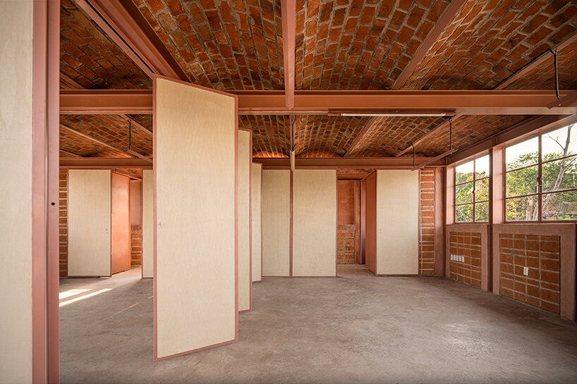 vaulted brickwork community center built by the citizens adorns rural mexico