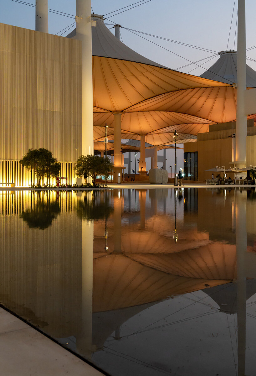 clusters of volumes & voids weave through airport terminal for islamic arts biennale complex in jeddah