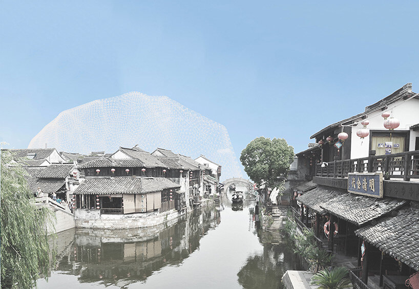 kazuyo sejima's design center appears like glass dome-enclosed island floating in chinese river