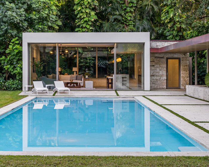 upstairs studio architecture's poolside pavilion nestled in miami backyard