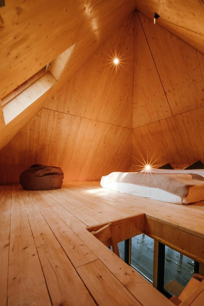 pyramid hipped roof tops wooden cabin in chinese woodland