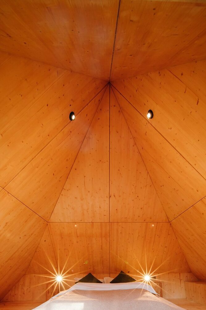 pyramid hipped roof tops wooden cabin in chinese woodland