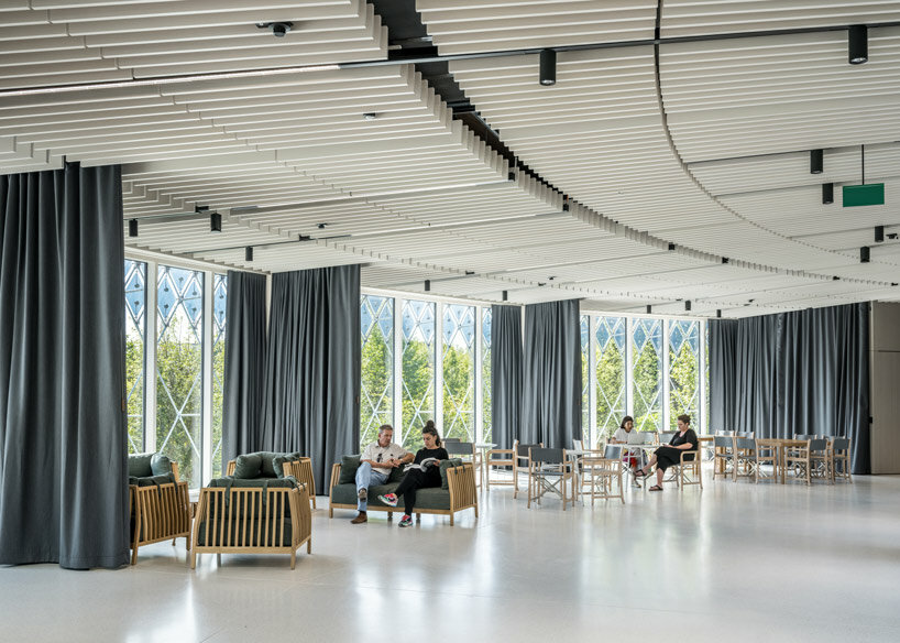 michele de lucchi + AMDL circle wrap novartis center with self-powered facade