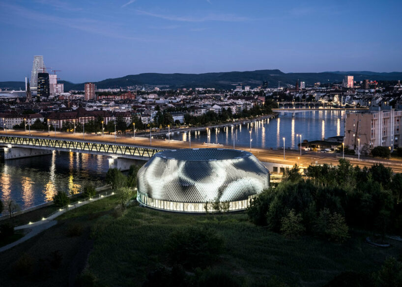 michele de lucchi + AMDL circle wrap novartis center in basel with self-powered facade