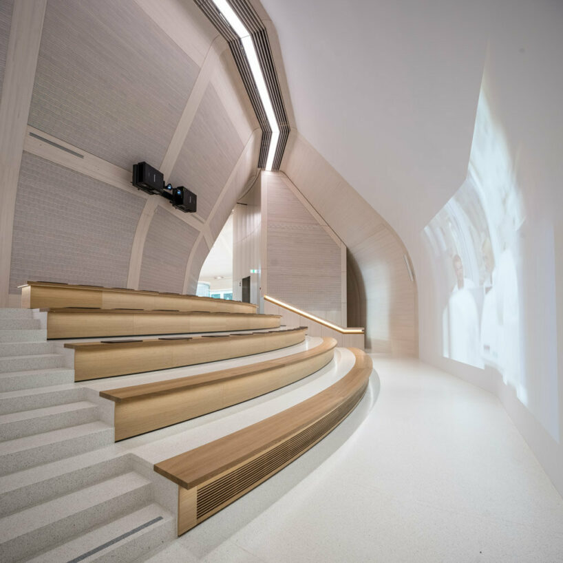 michele de lucchi + AMDL circle wrap novartis center in basel with self-powered facade