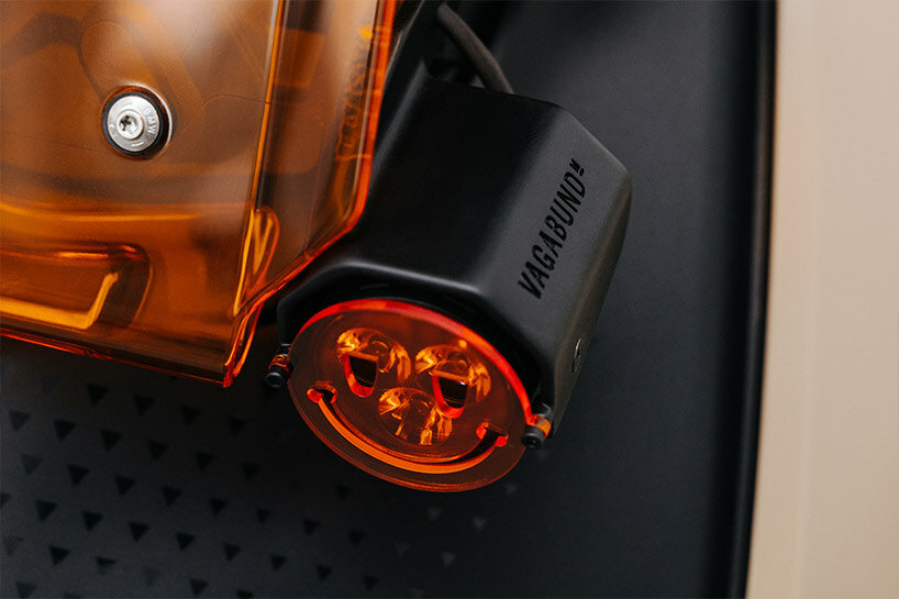 BMW CE 04 custom e-scooter comes with a surfboard rack and a smiley face