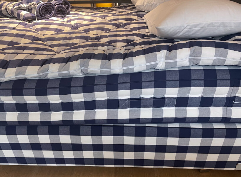 hästens bed blue check pattern