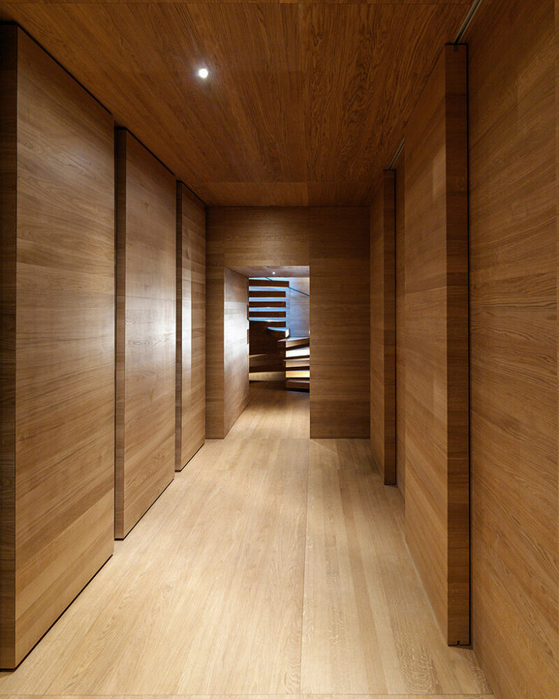 marte marte architects embeds monolithic ‘house of chambers’ into an austrian meadow