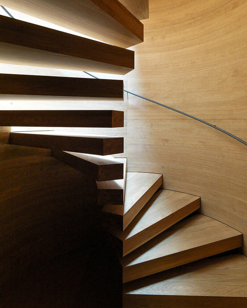 marte marte architects embeds monolithic ‘house of chambers’ into an austrian meadow